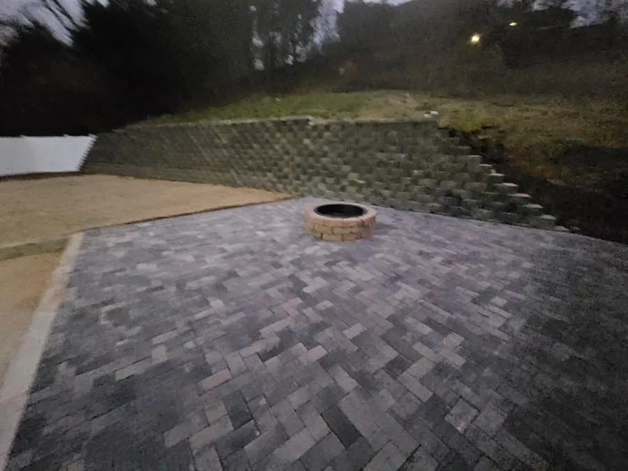 Paver patio with a fire pit and retaining wall, SC Concrete LLC
